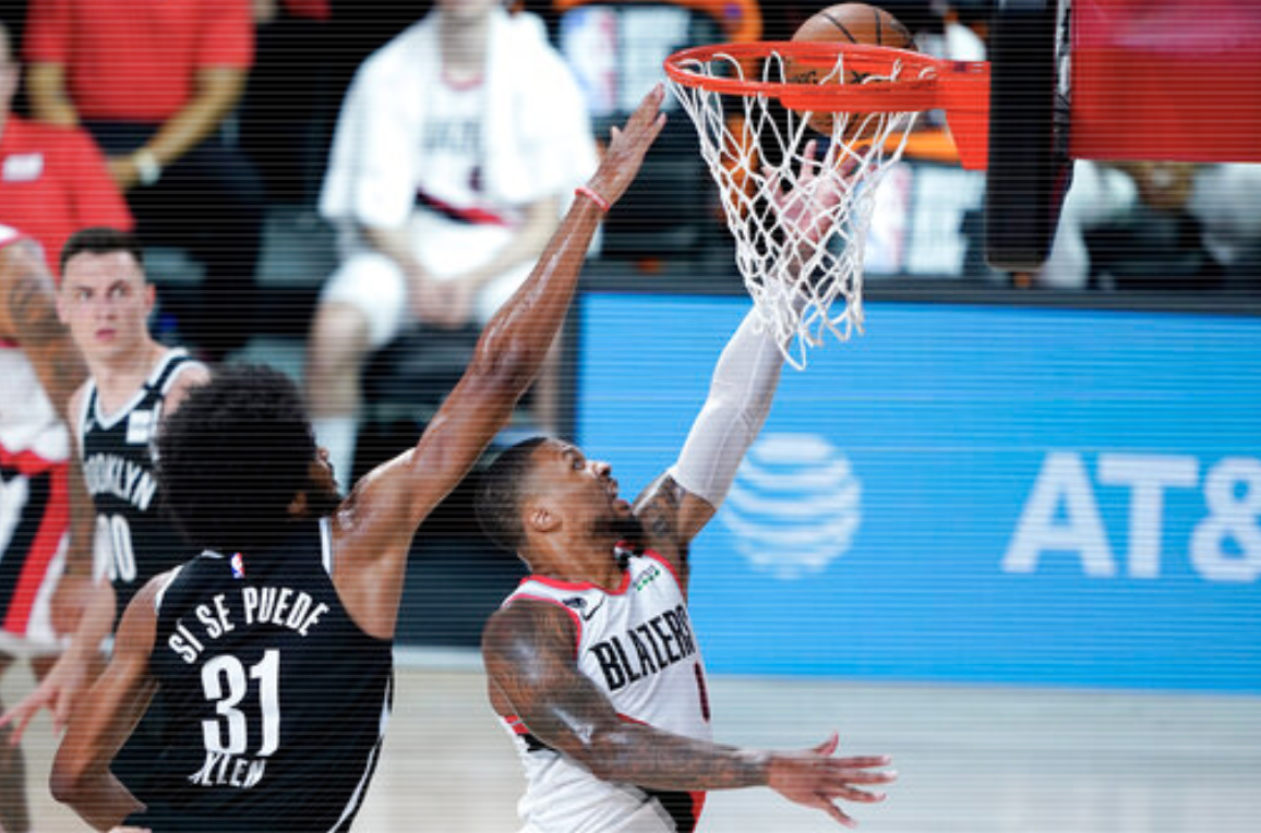 Lillard, Blazers escape Nets, advance to play-in series ...