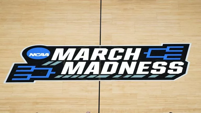 NCAA March Madness tournament logo at center court